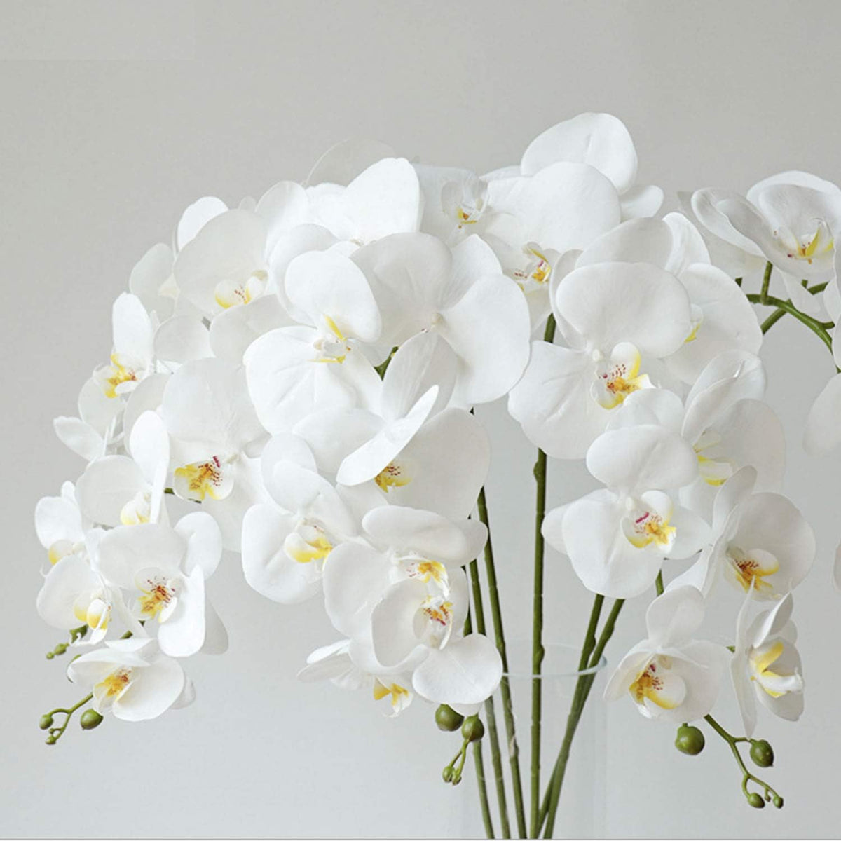 32 Inches Artificial Phalaenopsis Flowers 4 Pcs with 2 Bundles Leaves Artificial Orchid Flowers Stem Plants for Home Décor (White)