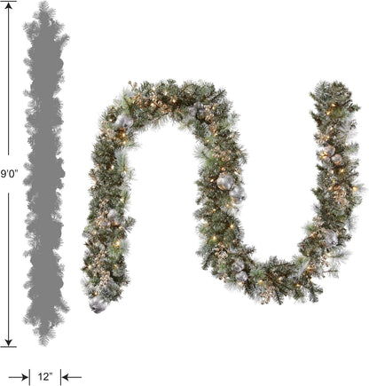 Pre-Lit Artificial Christmas Garland, Green, Pomegranate Pine, White Lights, Decorated With Ball Ornaments, Berry Clusters, Plug In, Christmas Collection, 9 Feet
