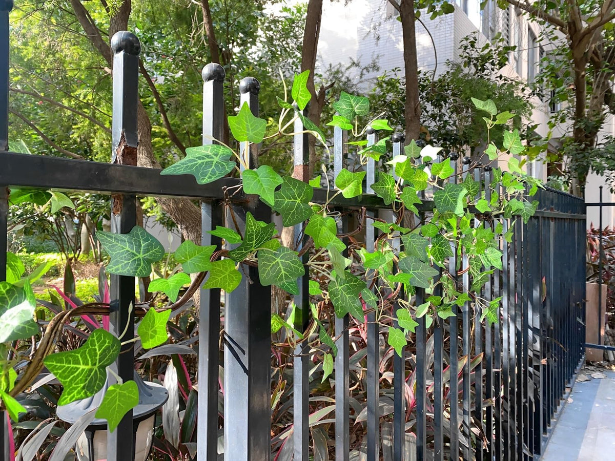 Artificial Rattan Tree Vines with Creeper Leaves Climbing Ivy Branches Grapevines UV Resistant Greenery Garland for Home Garden Landscape wall Hanging Climber Habitat Decor 43” (Green - Pack 4)
