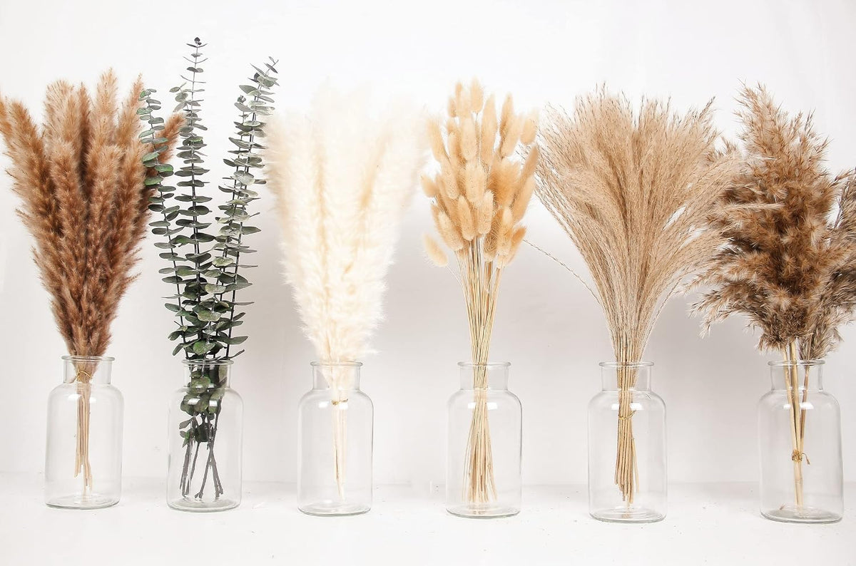 of Boho Pampas Grass Decor, Naturally Dried Pompas, Bunny Tails Dried Flowers, and dried eucalyptus. Perfect for Weddings, Boho Party Decorations, and Table Decor.