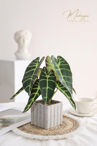 Artificial Potted Plant, Lifelike Faux Greenery in Decorative Cement-Look Square Pot for Indoor Home Decor Centerpieces (Alocasia)